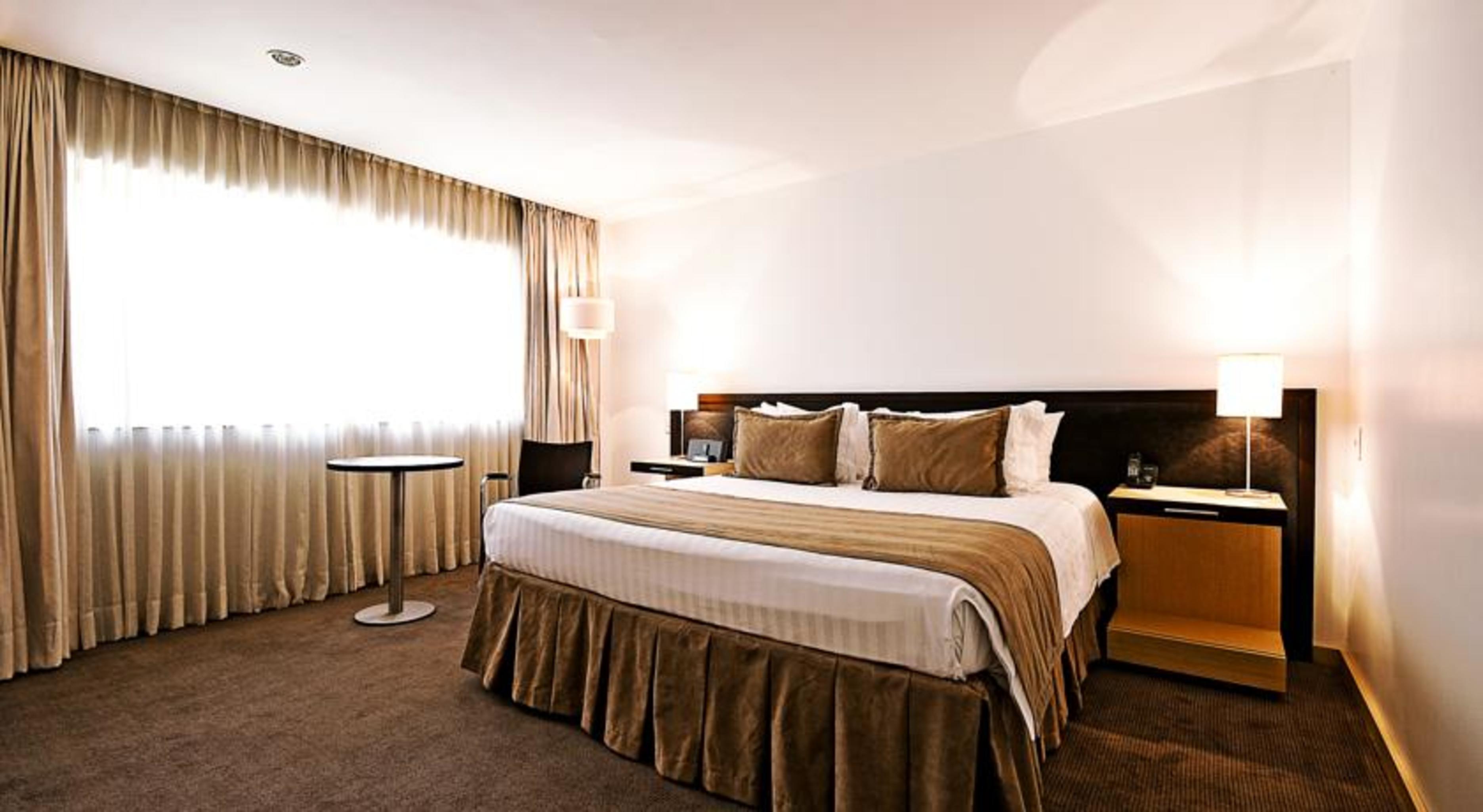 โรงแรมโมวิช ลาส โลมาส ริโอเนโกร ภายนอก รูปภาพ A bedroom at the hotel